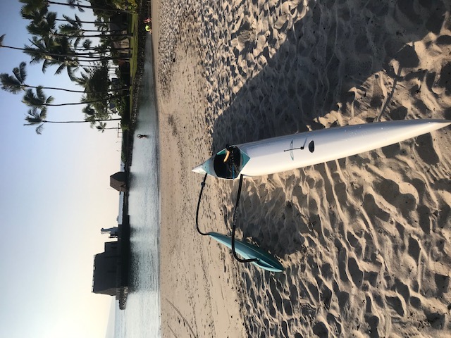 An OC1 - 1-person outrigger canoe at King Kam III hotel beach thumbnail