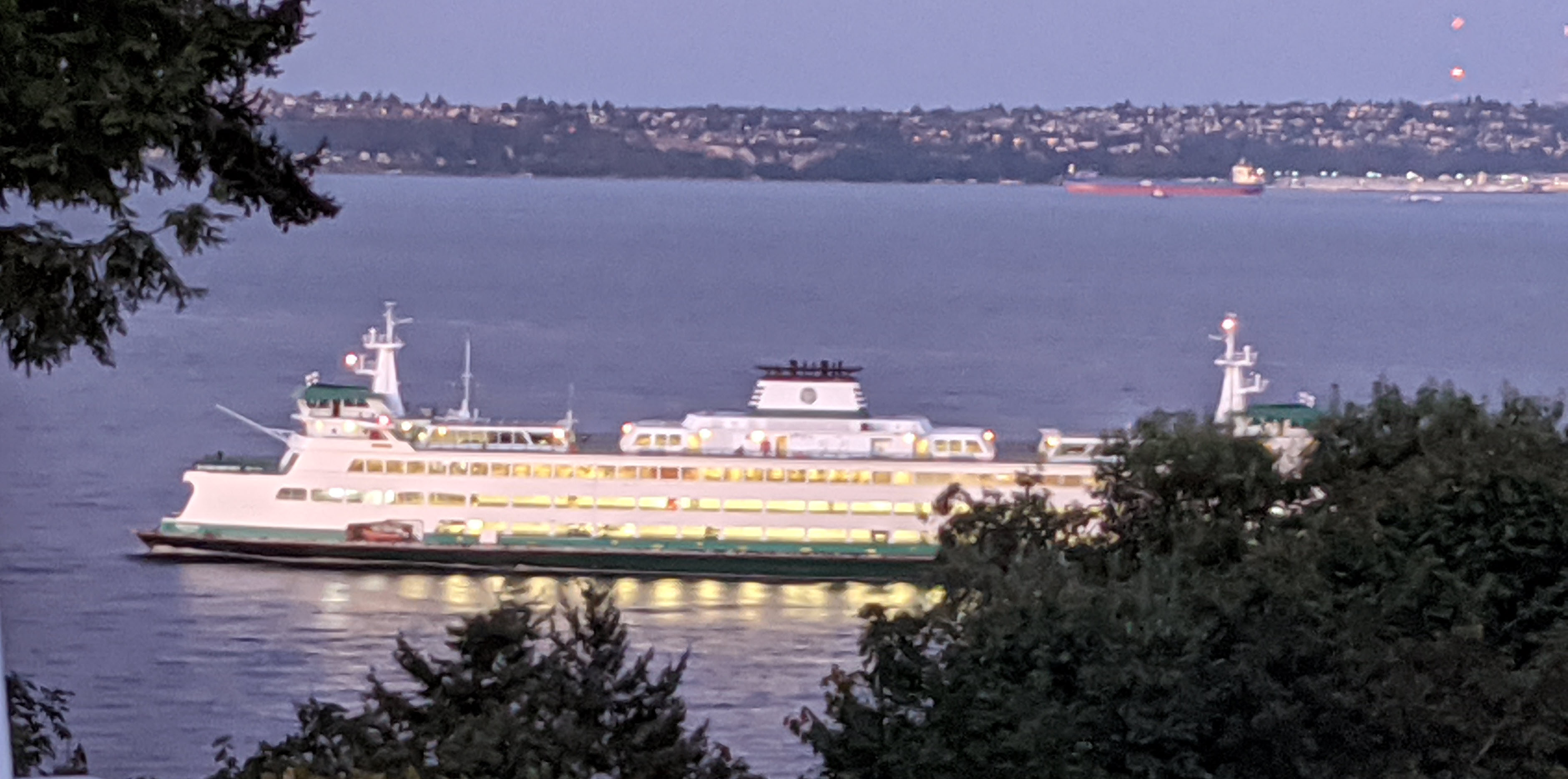 Seattle-Bainbridge Ferry passing in front of Bill Point thumbnail